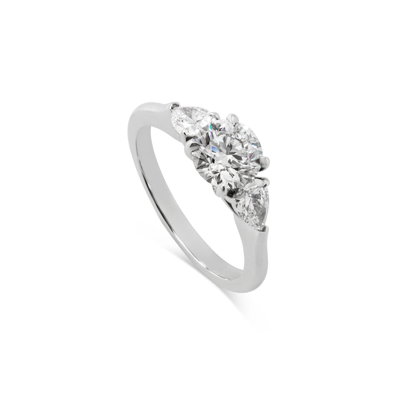 Round Solitaire Ring with Pear Shaped Diamonds