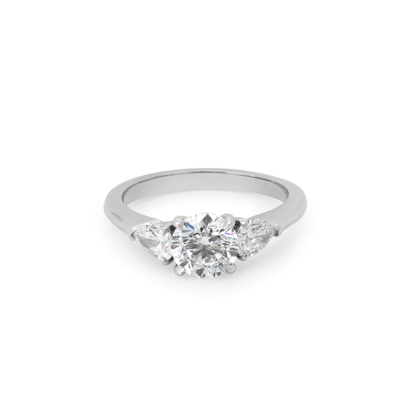 Round Solitaire Ring with Pear Shaped Diamonds